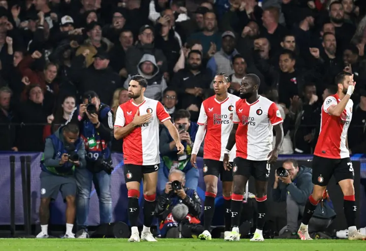Alireza Jahanbakhsh celebrates sealing Feyenoord's win over nine-man Celtic