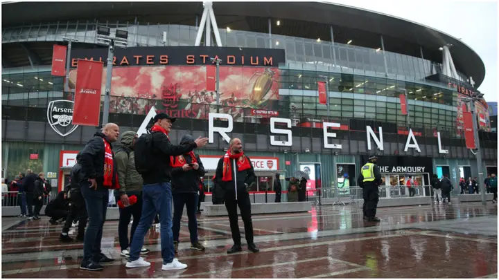 Fans outside the stadium before the UEFA Champions League Group B match at the Emirates Stadium. Photo by Nigel French.