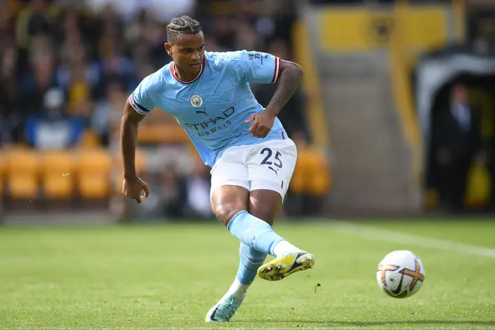 Manchester City's Manuel Akanji heads the ball during the