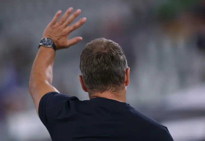 Sacked: Germany coach Hansi Flick at Saturday's fateful 4-1 loss to Japan