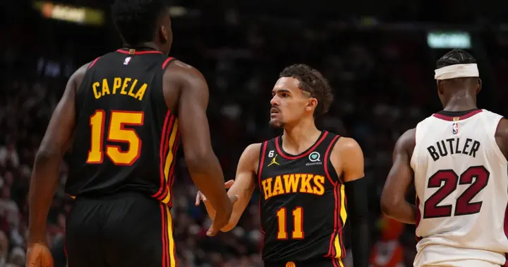 NBA star Trae Young shows up to a game with Lionel Messi's