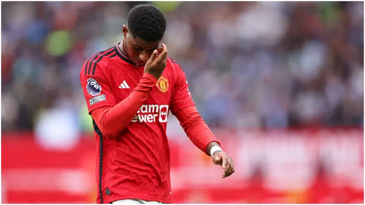 A dejected Marcus Rashford at full time during the Premier League match between Manchester United and Brighton at Old Trafford. Photo by Robbie Jay Barratt.