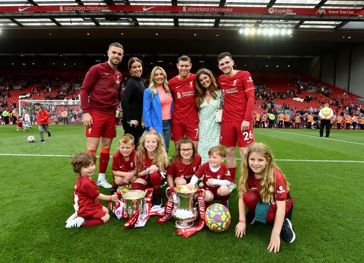 Jordan Henderson, Andrew Robertson and James Milner with their families