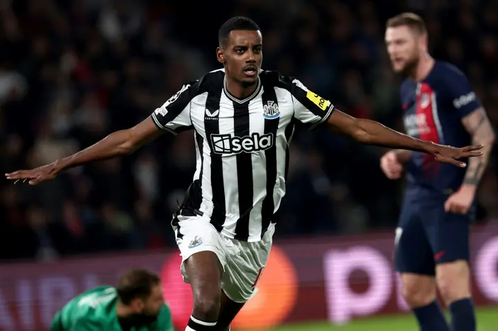Alexander Isak turns away in celebration after putting Newcastle ahead against PSG