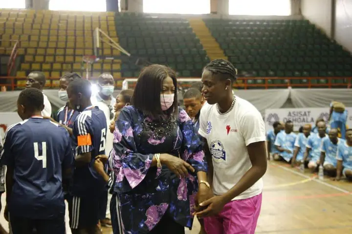 Mrs Ambode with Oshoala at the Girls and Para Soccer Championship