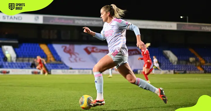 Arsenal's forward Alessia Russo runs with the ball during a Barclays Women's Super League match.