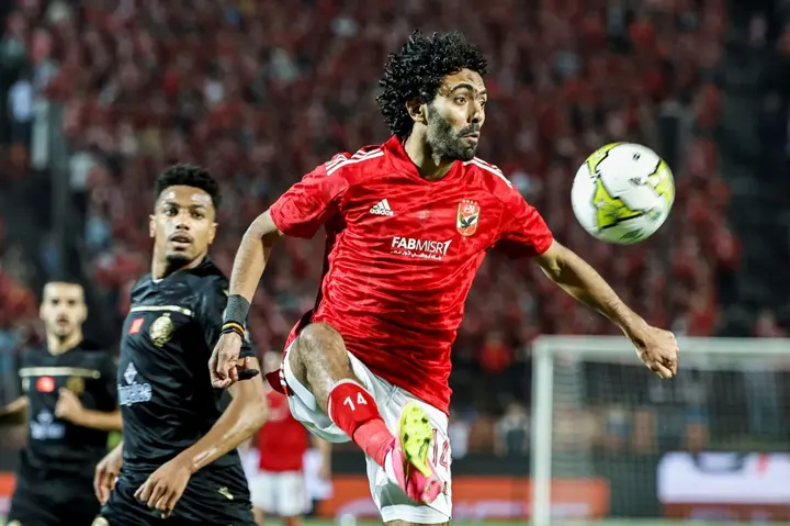 Al Ahly midfielder Hussein el Shahat (R) controls the ball during the first leg of the CAF Champions League final
