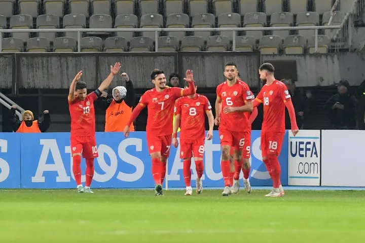 North Macedonia celebrate scoring in their draw against England