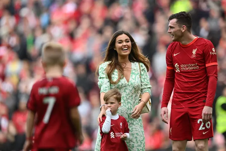 Andrew Robertson with his wife and son