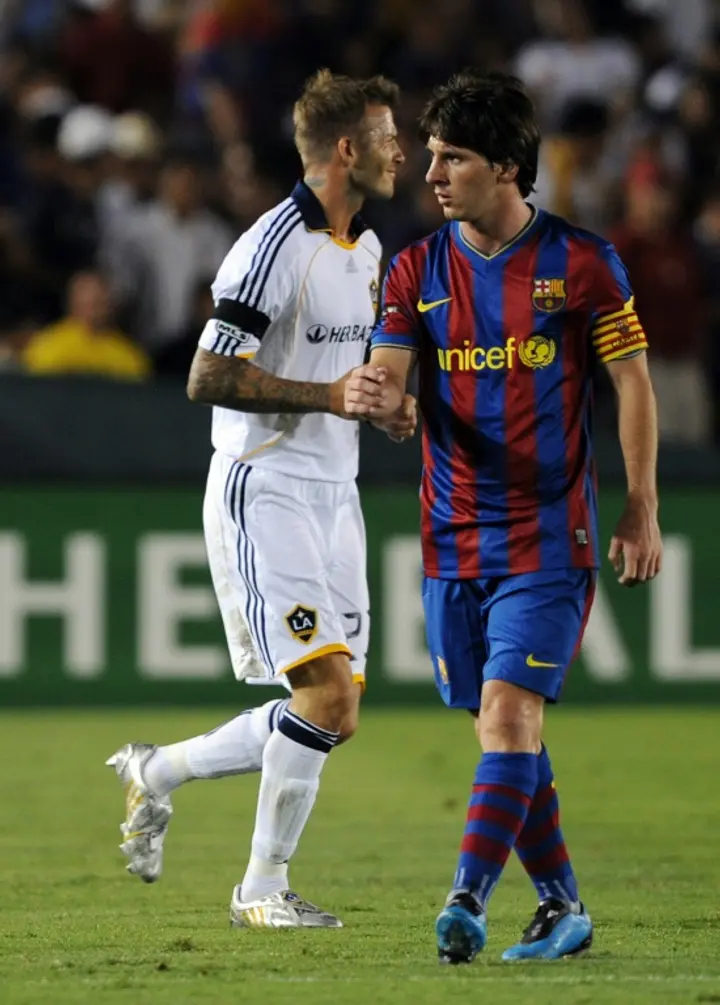 Lionel Messi in action for Barcelona against David Beckham of LA Galaxy in a friendly match in 2009