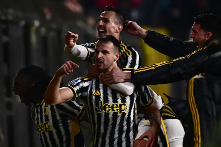 Juventus' Federico Gatti celebrates with teammates after scoring the winner against Monza