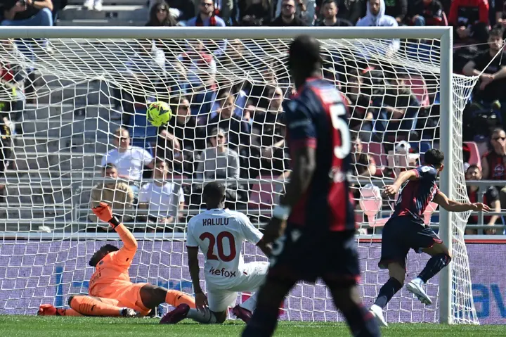 Nicola Sansone (R) netted after just 33 seconds against Milan