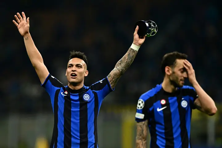 Lautaro Martinez salutes the Inter support after his team beat AC Milan in the Champions League semi-finals on Tuesday