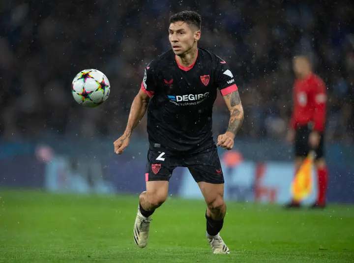 Gonzalo Montiel of Argentina's River Plate heads the ball during a