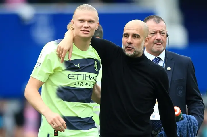 Manchester City manager Pep Guardiola with Erling Haaland last month