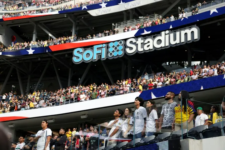 Fans stand for the national anthem before the start of the Leagues Cup Showcase friendly double-header at SoFi Stadium in Los Angeles